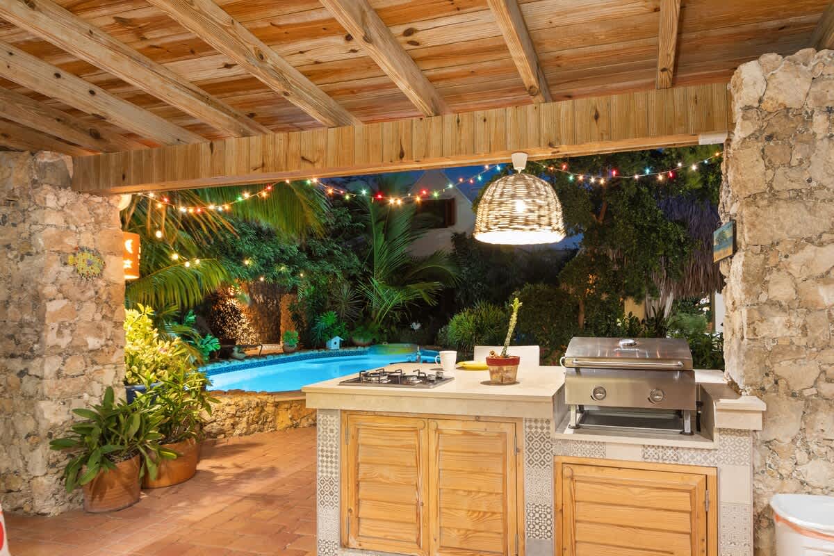 Outdoor barbecue kitchen at dusk